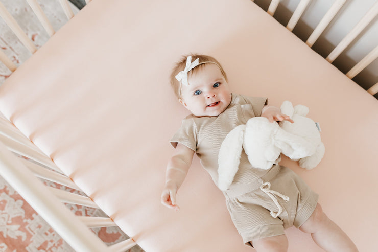 Copper Pearl Premium Knit Fitted Crib Sheet | Blush